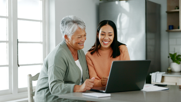 Mother and daughter at computer