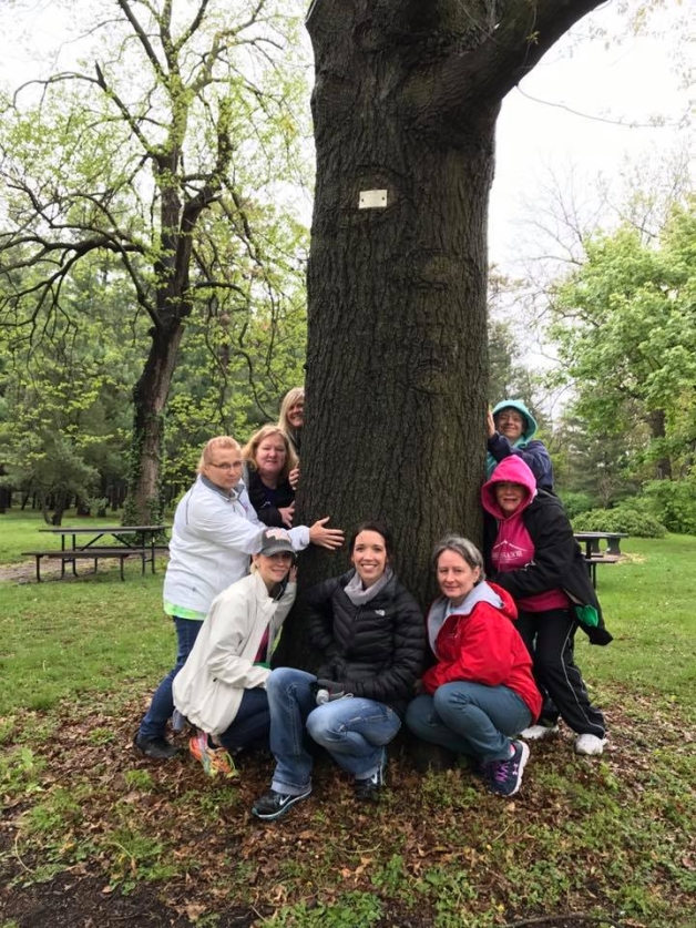 Ambassador Health Team Members "Hug a Tree"